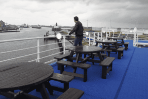 Deck of the Pride of Hull ferry with passenger enjoying the view