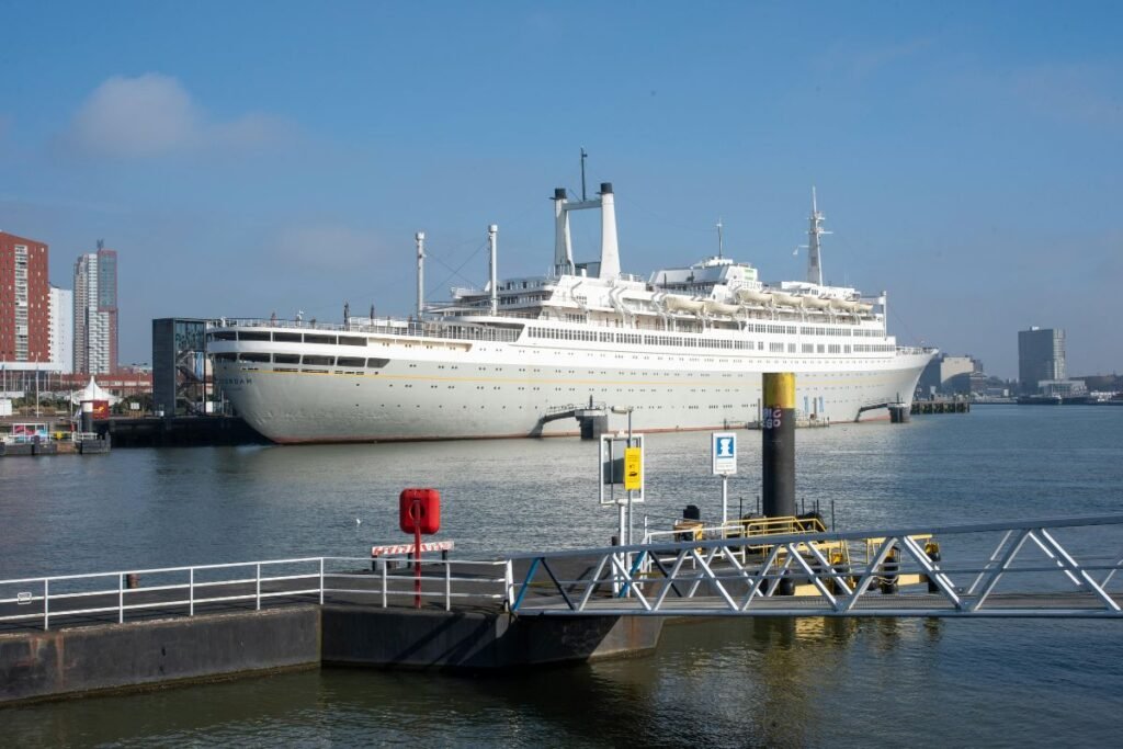 Historic ocean liner SS Rotterdam docked near the ferry port area